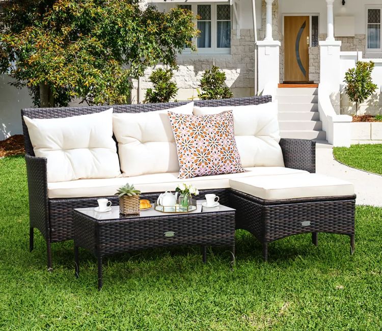 Dark Brown Rattan And Wicker Outdoor Sofa Set With Cream Cushions And Table