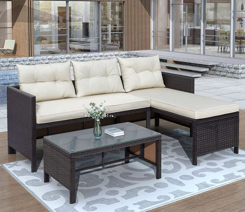 Black Rattan And Wicker Outdoor Furniture Set With Cream Cushions And Table