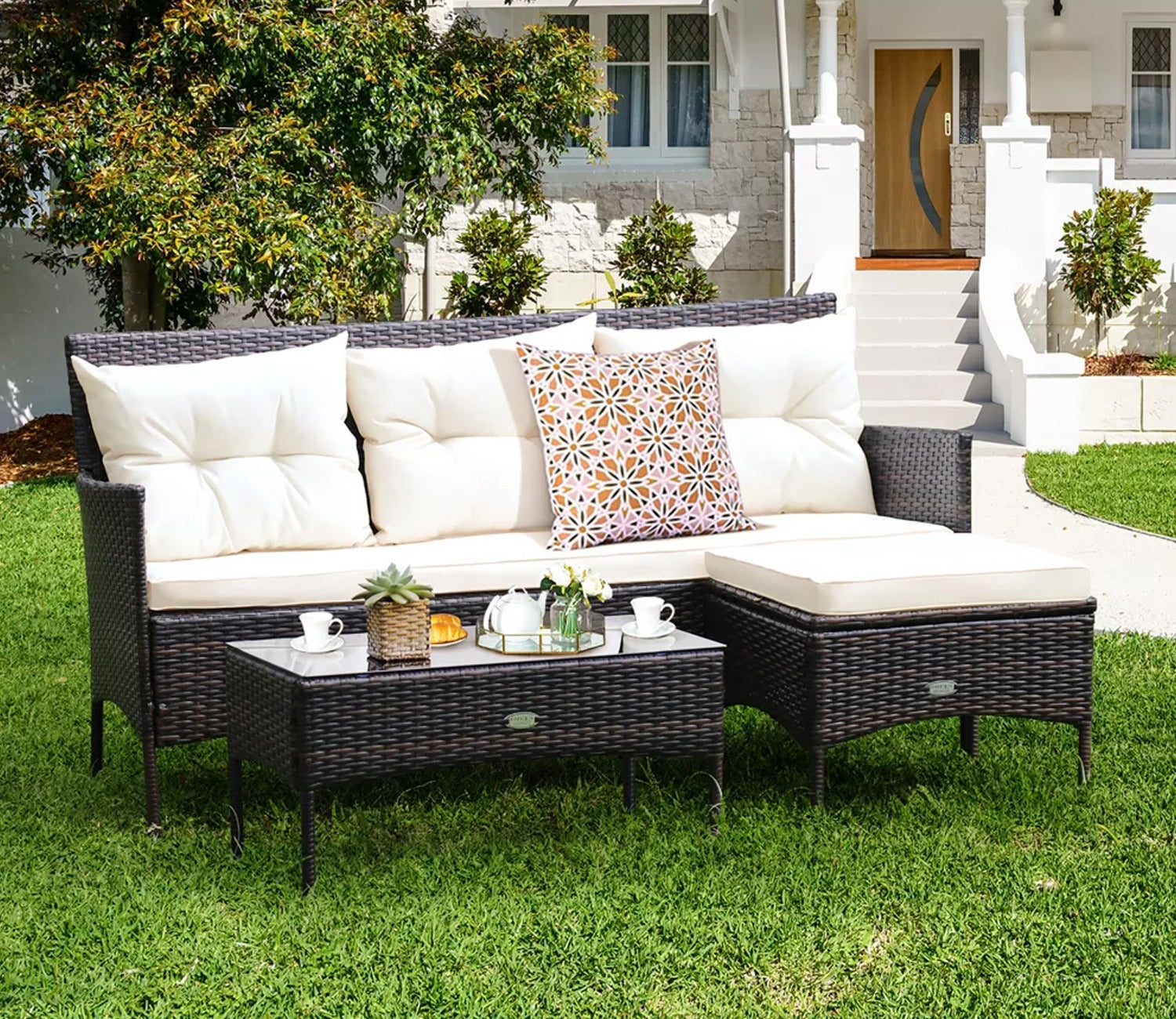 Dark Brown Rattan And Wicker Outdoor Sofa Set With Cream Cushions And Table