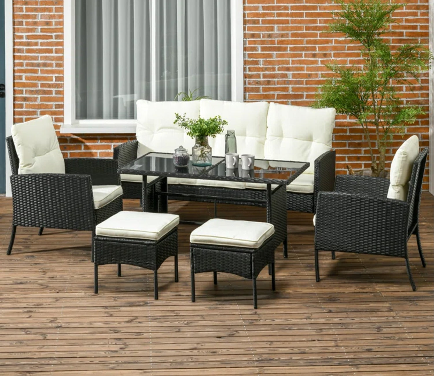 Black Rattan And Wicker Outdoor Sofa Set With Off White Cushions And Table