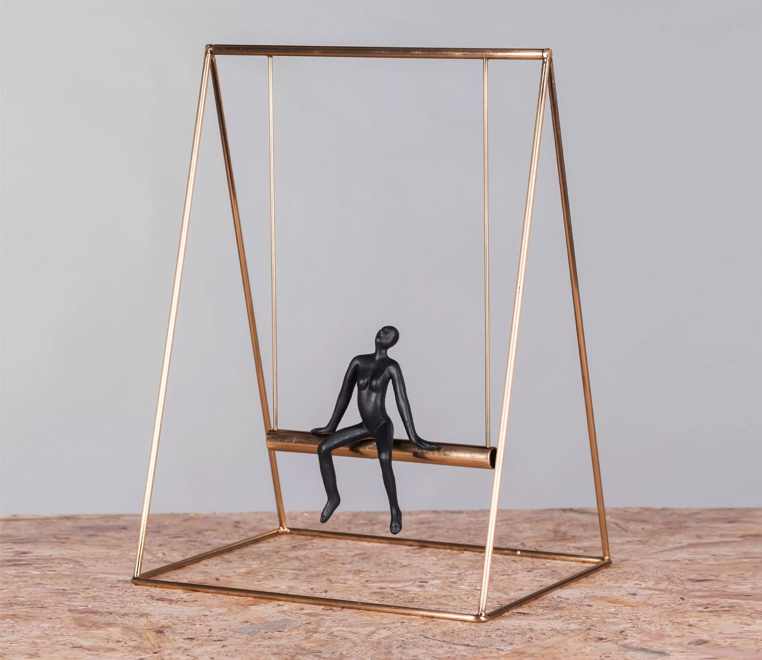 Human on a Golden Swing Figurine (S, Black)