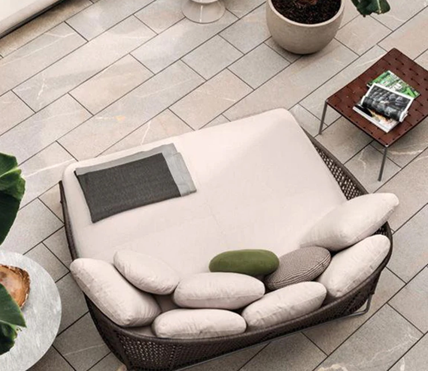 Brown Outdoor Patio Daybed With Cream Cushions