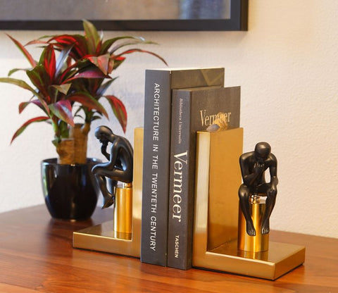 Enigmatic Black And Gold Book End