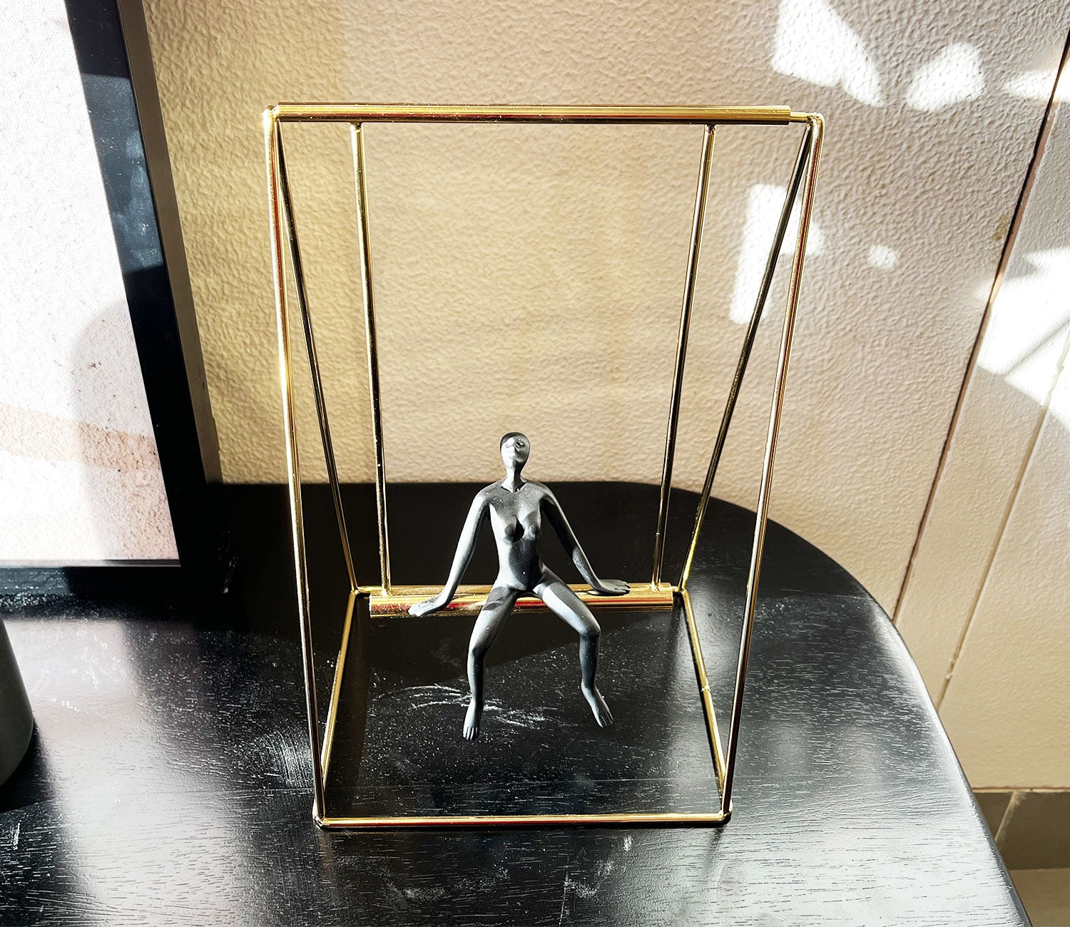 Human on a Golden Swing Figurine (S, Black)
