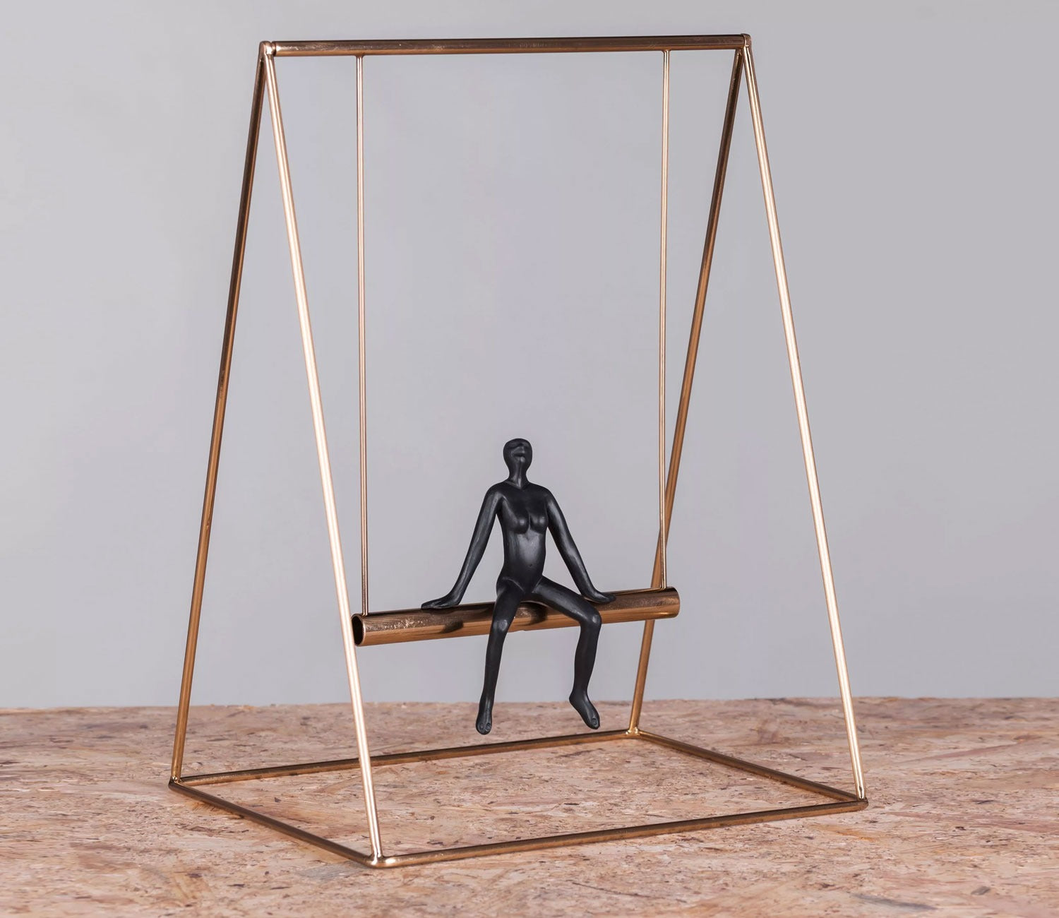 Human on a Golden Swing Figurine (S, Black)