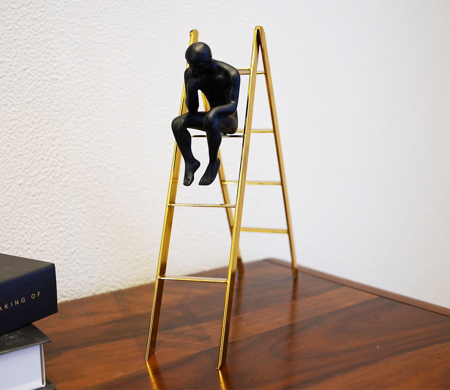 Black Human on a Staircase Figurine